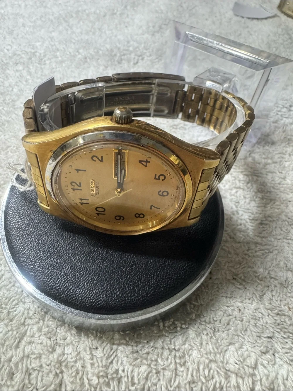 Seiko Gold Tone Quartz Watch with Black Numerals
